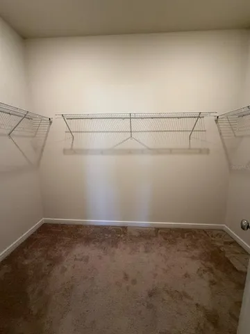 a view of a room with racks on the wall