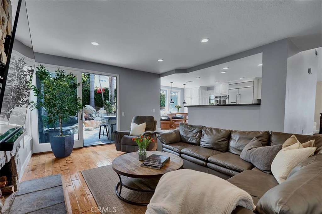 22 Colonial Irvine, CA 92620 - Photo 15 of 47 a living room with furniture and a large window