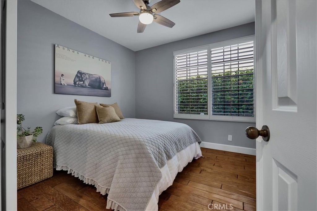 22 Colonial Irvine, CA 92620 - Photo 17 of 47 a bedroom with a bed and window
