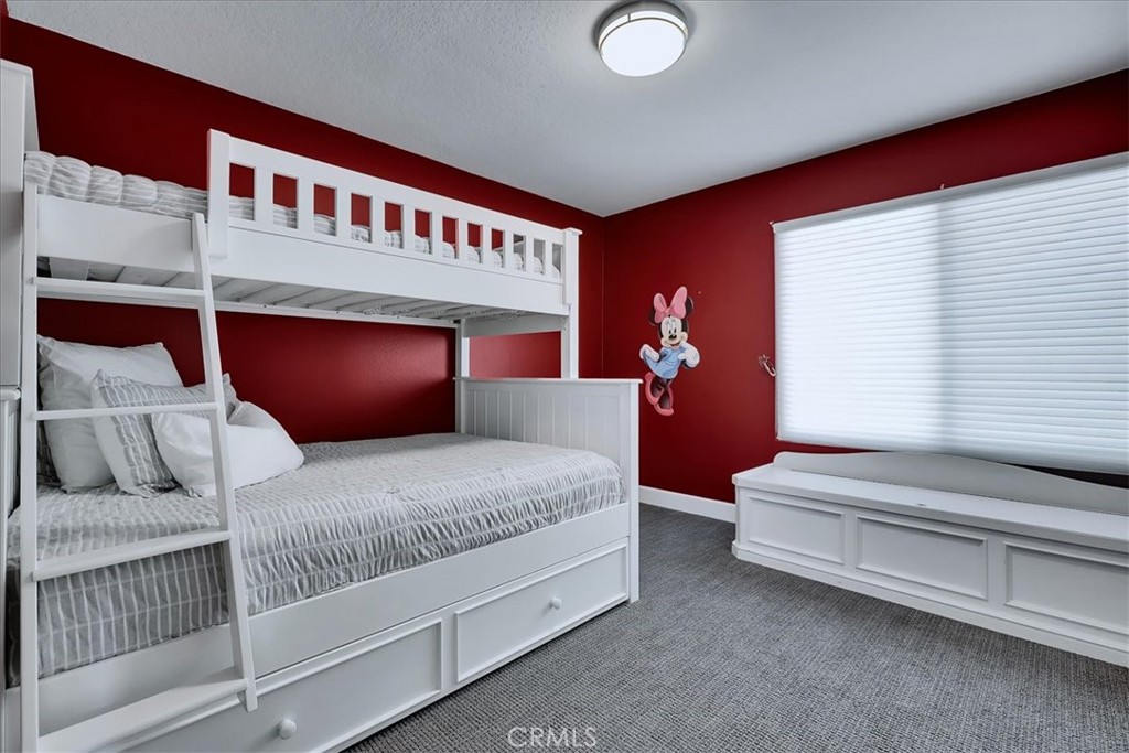 22 Colonial Irvine, CA 92620 - Photo 26 of 47 a bedroom with bed and a window