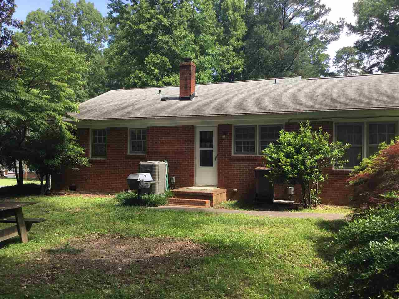 519 West Cornwall Road Cary, NC 27511 - Photo 24 of 29 Back of home and a natural gas line in place for a gas grill Exterior Back