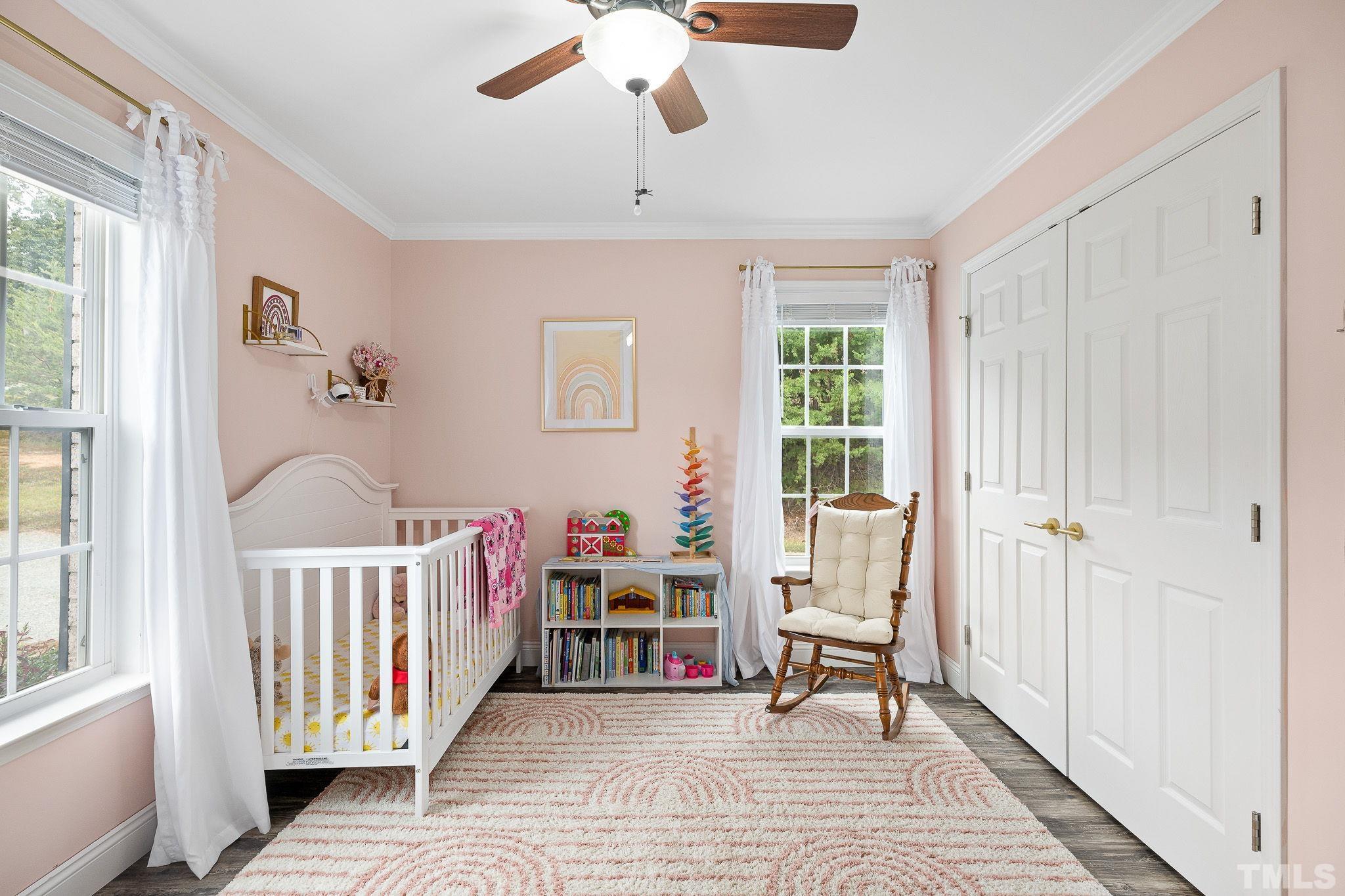 7405 Buckingham Mountain Road Snow Camp, NC 27349 - Photo 18 of 26 a bedroom with a bed and a window