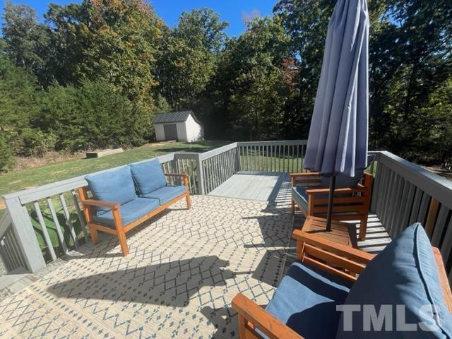 7405 Buckingham Mountain Road Snow Camp, NC 27349 - Photo 20 of 26 a view of a patio with a couch