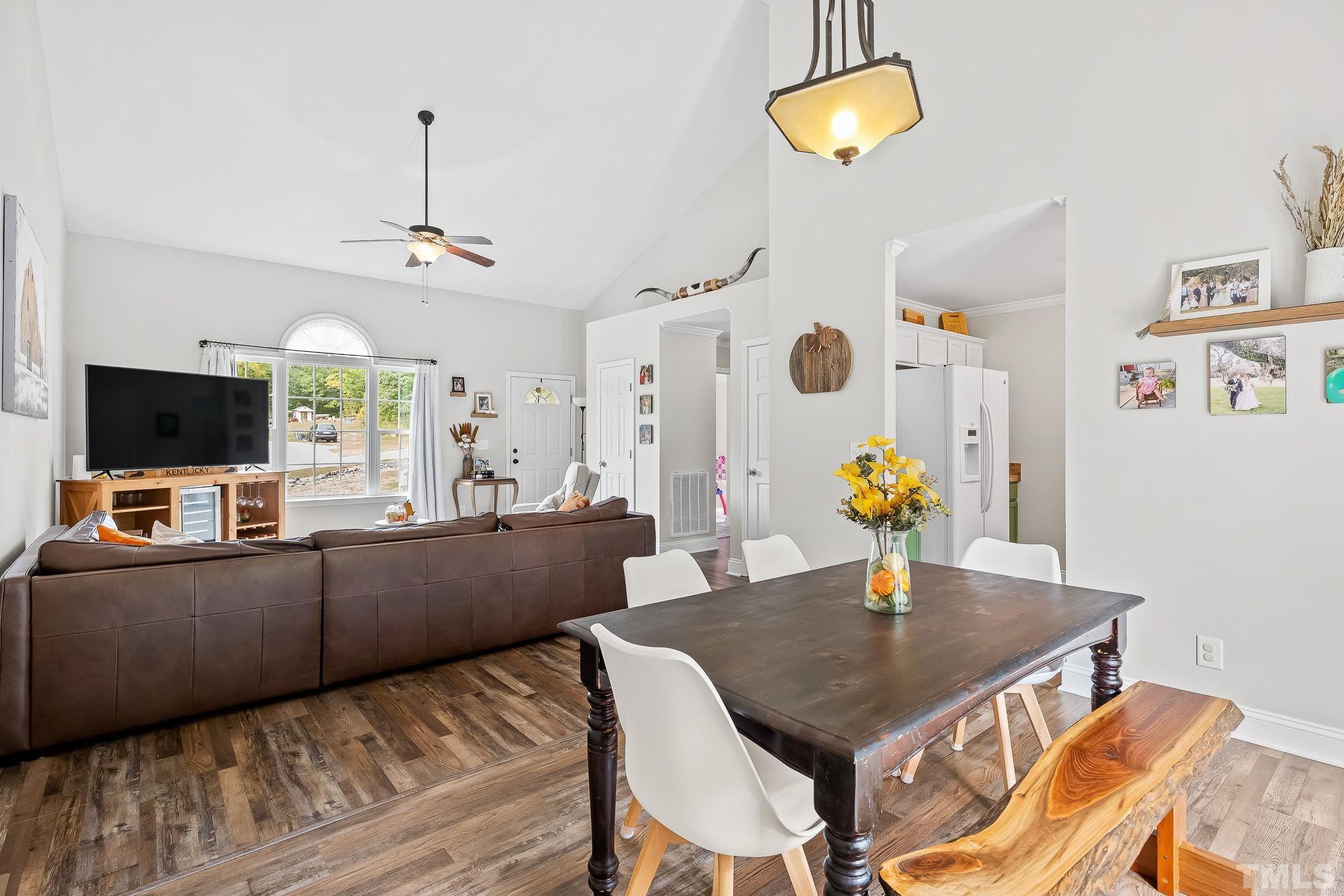 7405 Buckingham Mountain Road Snow Camp, NC 27349 - Photo 7 of 26 a living room with furniture and a flat screen tv