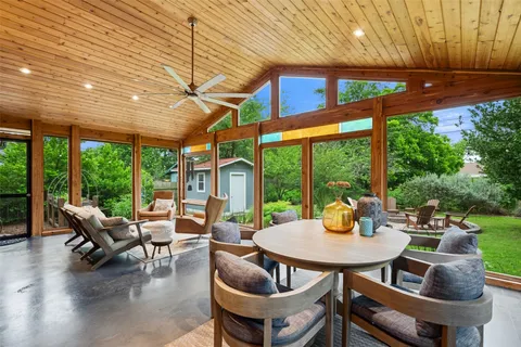 a outdoor space with patio the couches and dining table with garden view