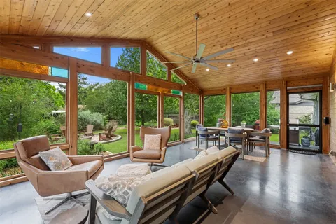 a outdoor space with patio the couches and chairs with wooden floor