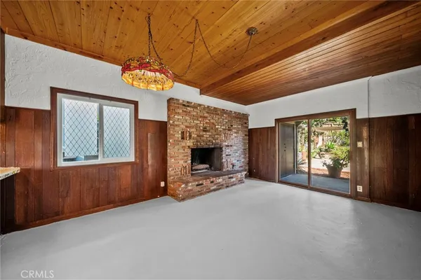 a large kitchen with stainless steel appliances granite countertop a stove sink and cabinets