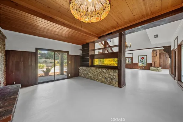 a kitchen with stainless steel appliances granite countertop a stove and a refrigerator