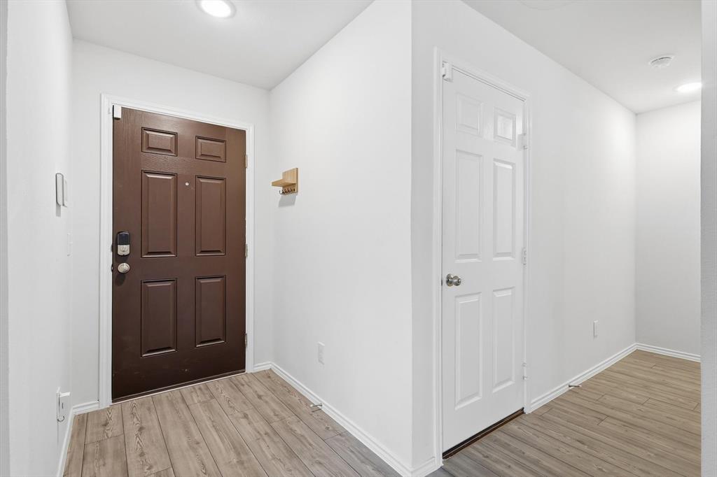 16041 Pious Drive Haslet, TX 76052 - Photo 3 of 36 Entryway featuring recessed lighting and light wood-style floors