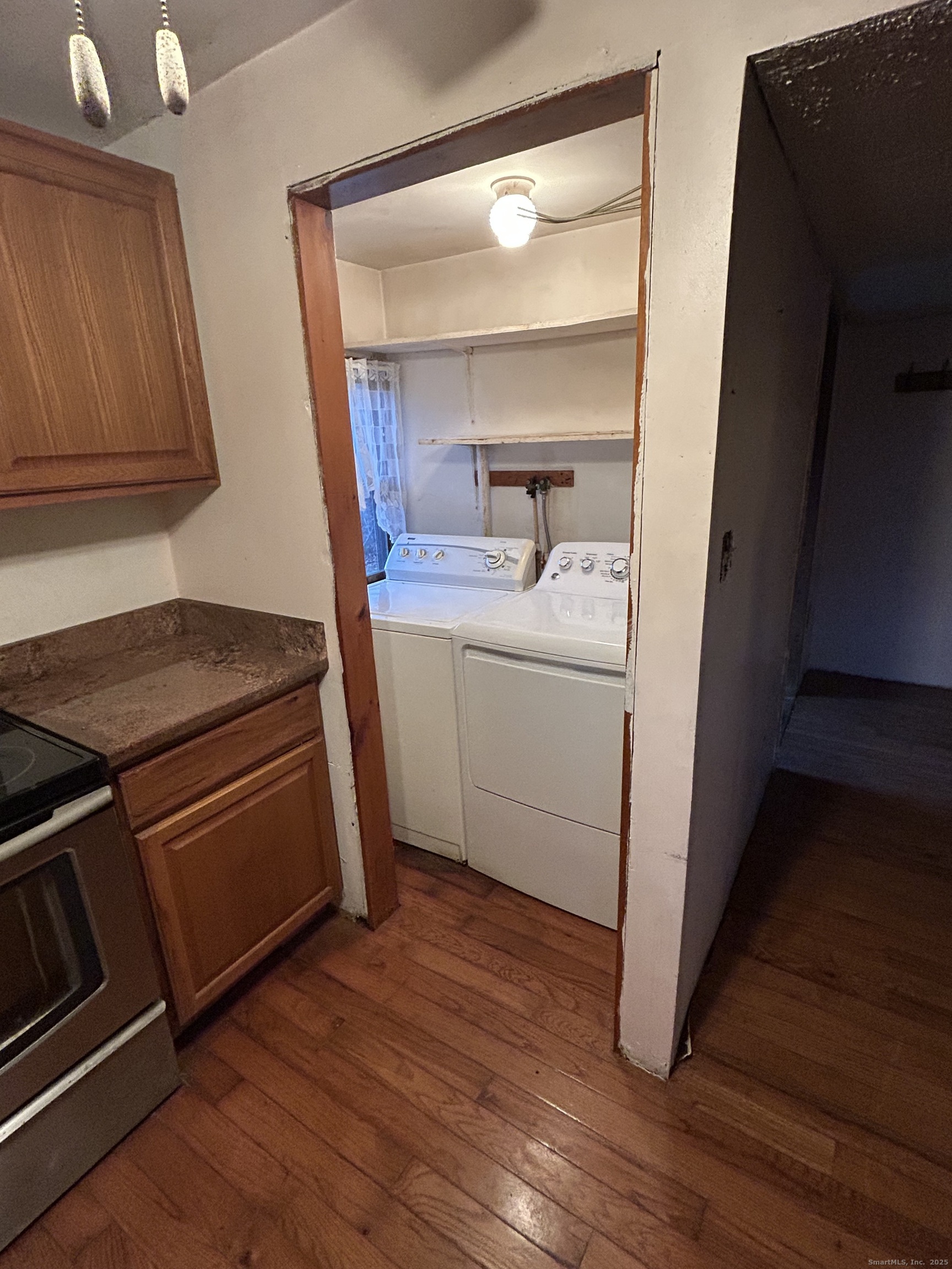 236 Union City Road Naugatuck, CT 06770 - Photo 8 of 28 a kitchen with a sink and wooden floor