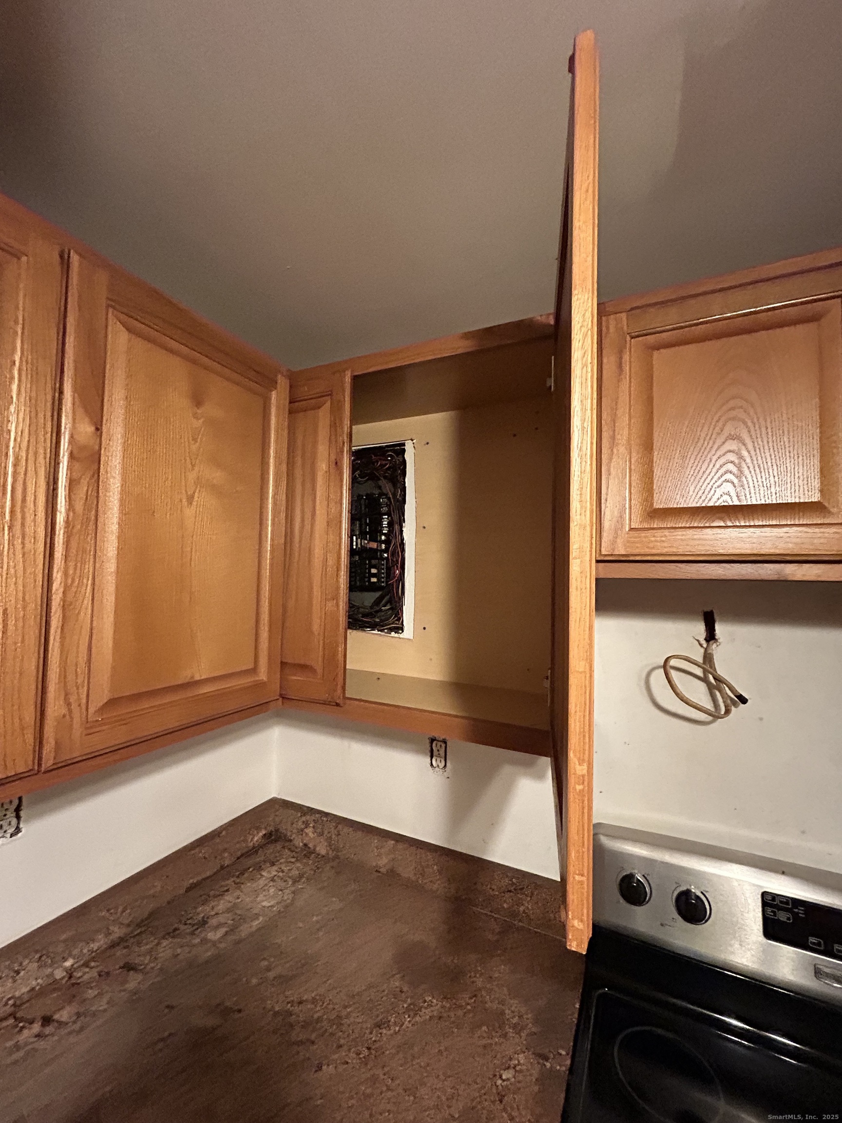 236 Union City Road Naugatuck, CT 06770 - Photo 9 of 28 a view of an empty room with wooden floor and a window