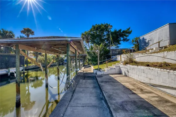 a view of swimming pool with a patio