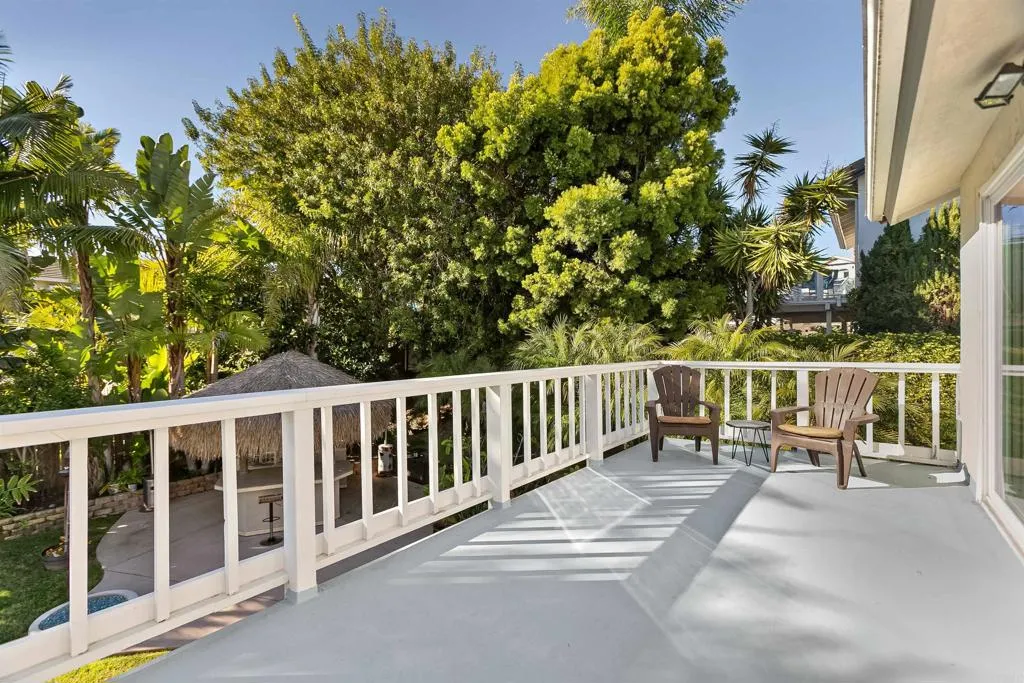 2252 Soledad Rancho Road San Diego, CA 92109 - Photo 19 of 39 a view of a chairs and table in the balcony