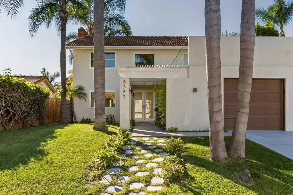 2252 Soledad Rancho Road San Diego, CA 92109 - Photo 26 of 39 front view of a house with a yard