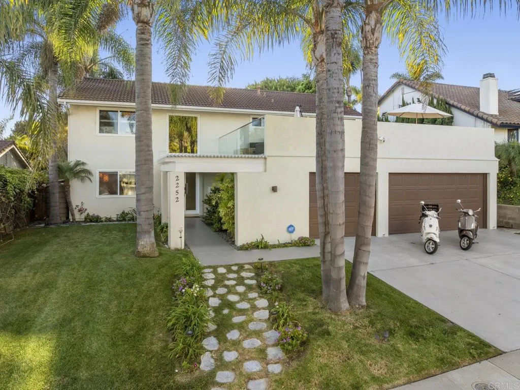 2252 Soledad Rancho Road San Diego, CA 92109 - Photo 37 of 39 a front view of a house with garden