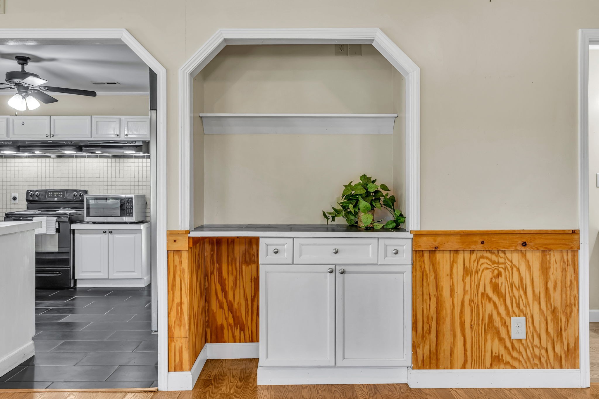 427 Telegraph Street Tennessee Ridge, TN 37178 - Photo 13 of 47 a kitchen with stainless steel appliances a refrigerator and cabinets
