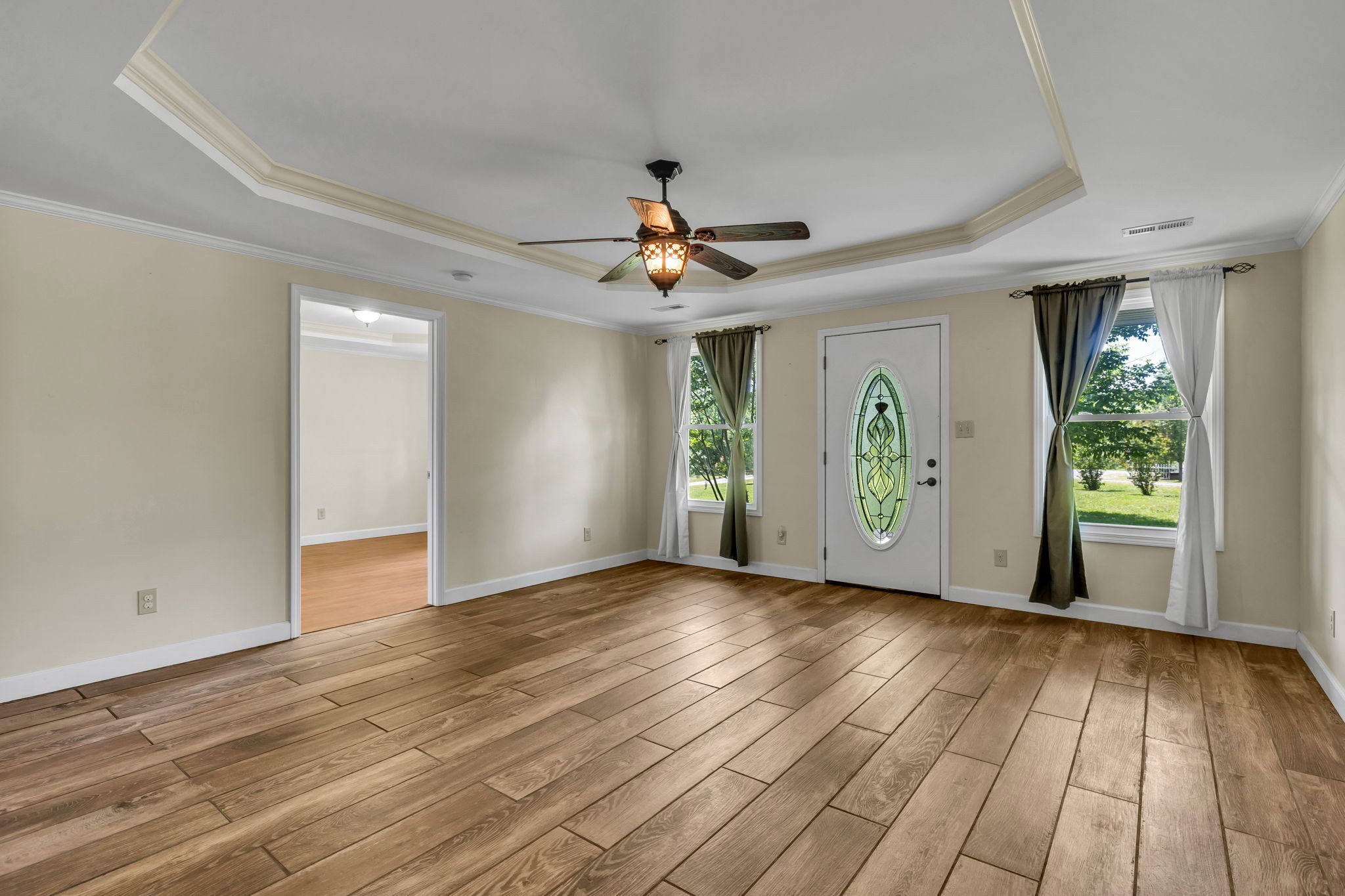 427 Telegraph Street Tennessee Ridge, TN 37178 - Photo 17 of 47 a view of room with window ceiling fan and hardwood floor