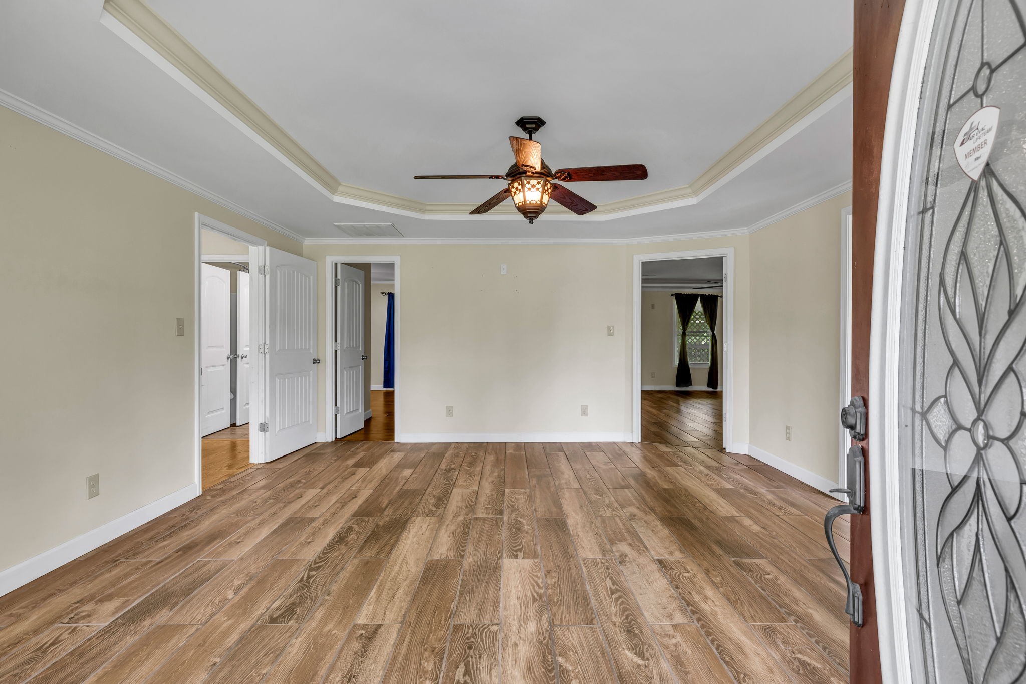 427 Telegraph Street Tennessee Ridge, TN 37178 - Photo 18 of 47 a view of a livingroom with wooden floor and a ceiling fan