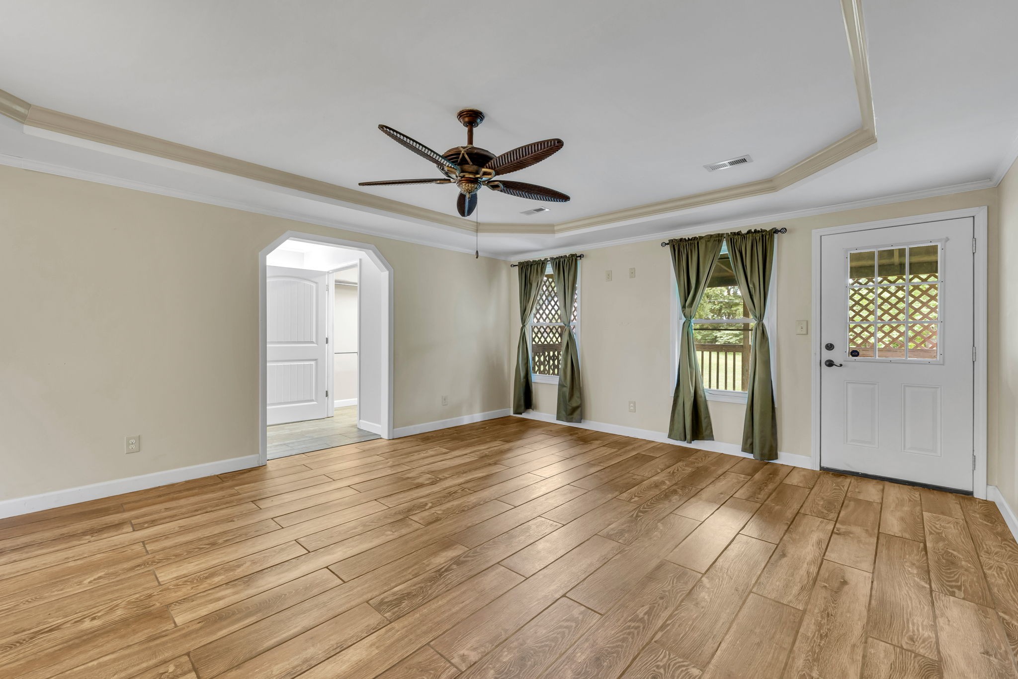 427 Telegraph Street Tennessee Ridge, TN 37178 - Photo 20 of 47 a view of a livingroom with a chandelier fan and windows