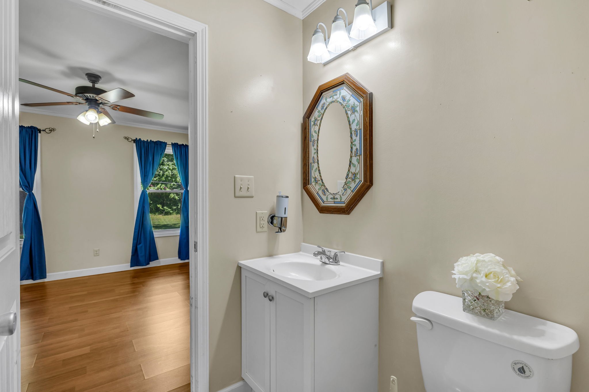 427 Telegraph Street Tennessee Ridge, TN 37178 - Photo 27 of 47 a view of a hallway with entryway wooden floor and a chandelier