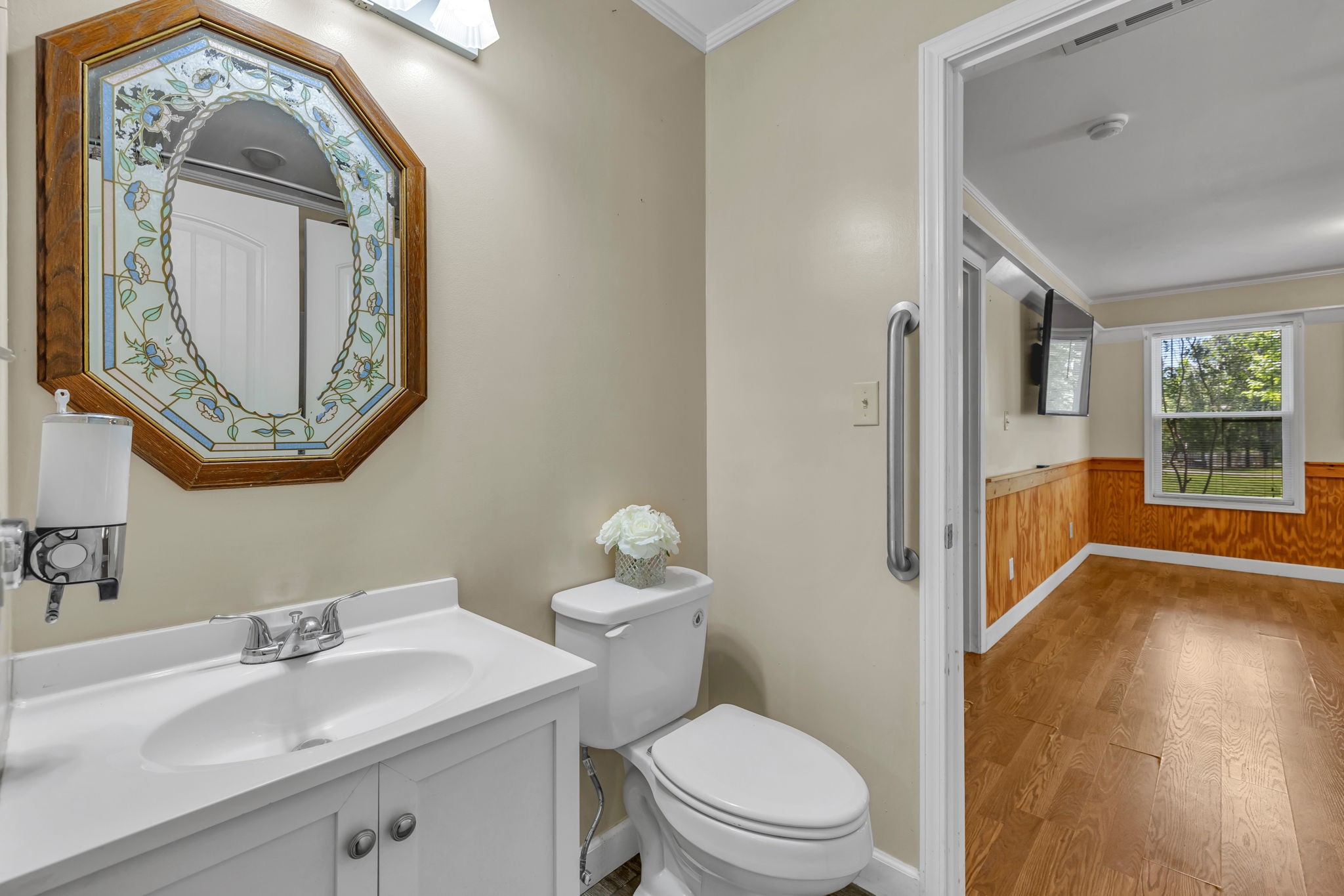 427 Telegraph Street Tennessee Ridge, TN 37178 - Photo 28 of 47 a bathroom with a toilet a sink and a mirror