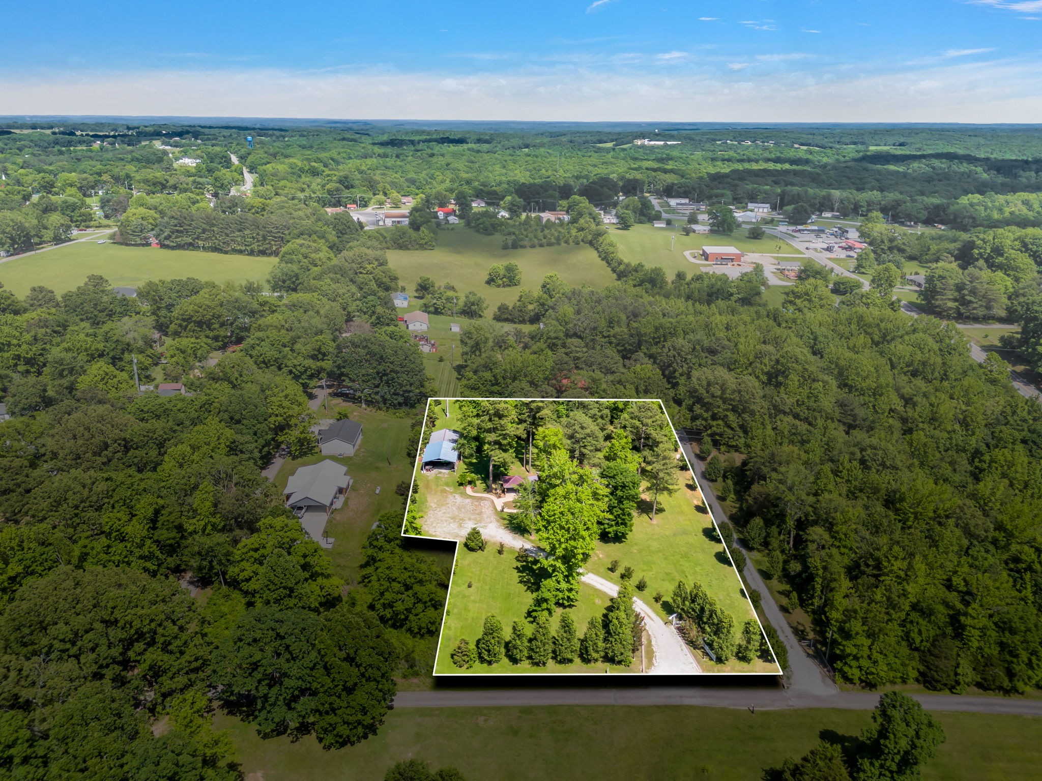 427 Telegraph Street Tennessee Ridge, TN 37178 - Photo 3 of 47 an aerial view of residential houses with outdoor space and trees