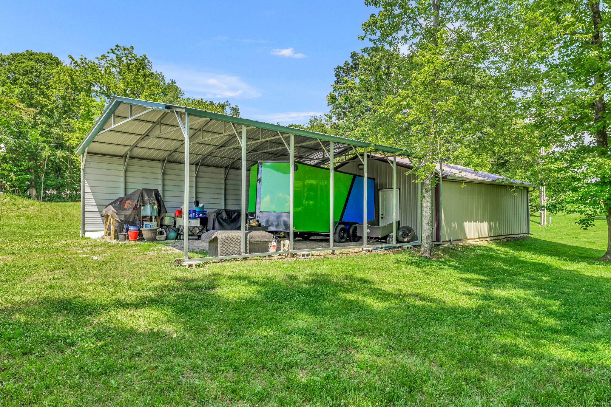427 Telegraph Street Tennessee Ridge, TN 37178 - Photo 31 of 47 a view of a house with backyard and sitting area