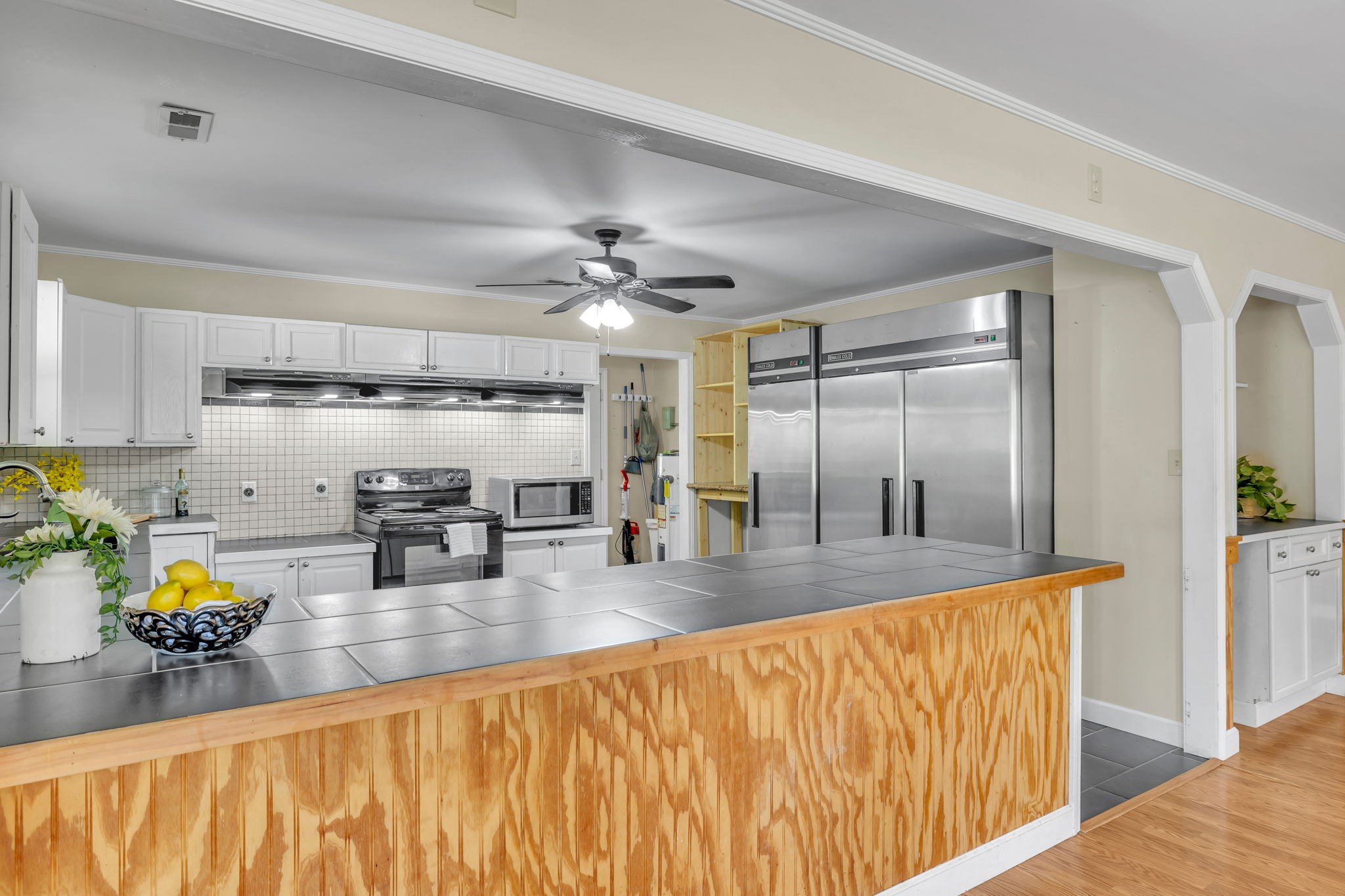 427 Telegraph Street Tennessee Ridge, TN 37178 - Photo 7 of 47 a kitchen with counter top space cabinets and stainless steel appliances