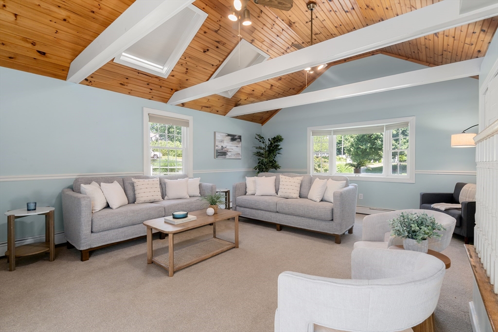 40 Hooper Street Westwood, MA 02090 - Photo 15 of 39 a living room with furniture and a large window