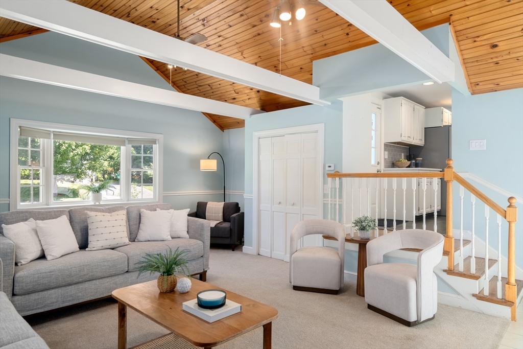 40 Hooper Street Westwood, MA 02090 - Photo 17 of 39 a living room with furniture and a window