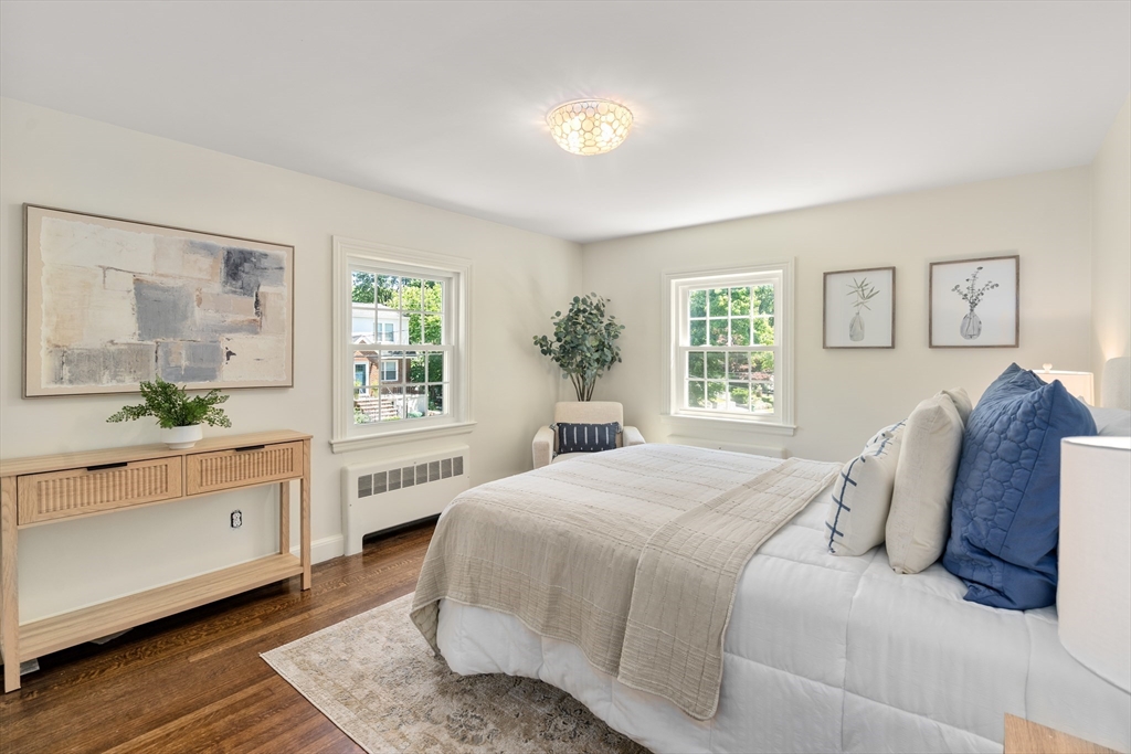 40 Hooper Street Westwood, MA 02090 - Photo 21 of 39 a bedroom with a large bed and a window