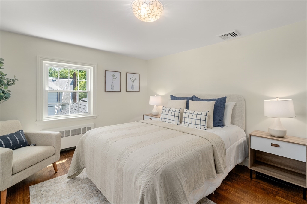 40 Hooper Street Westwood, MA 02090 - Photo 22 of 39 a bedroom with a bed and a couch