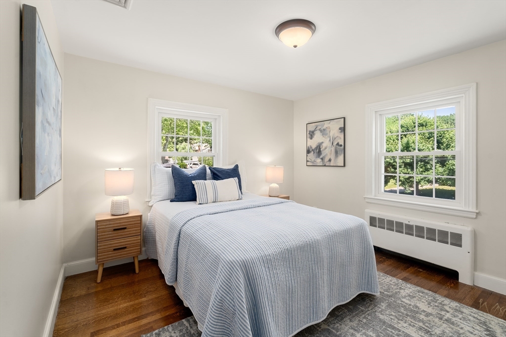 40 Hooper Street Westwood, MA 02090 - Photo 25 of 39 a bedroom with a bed and a window