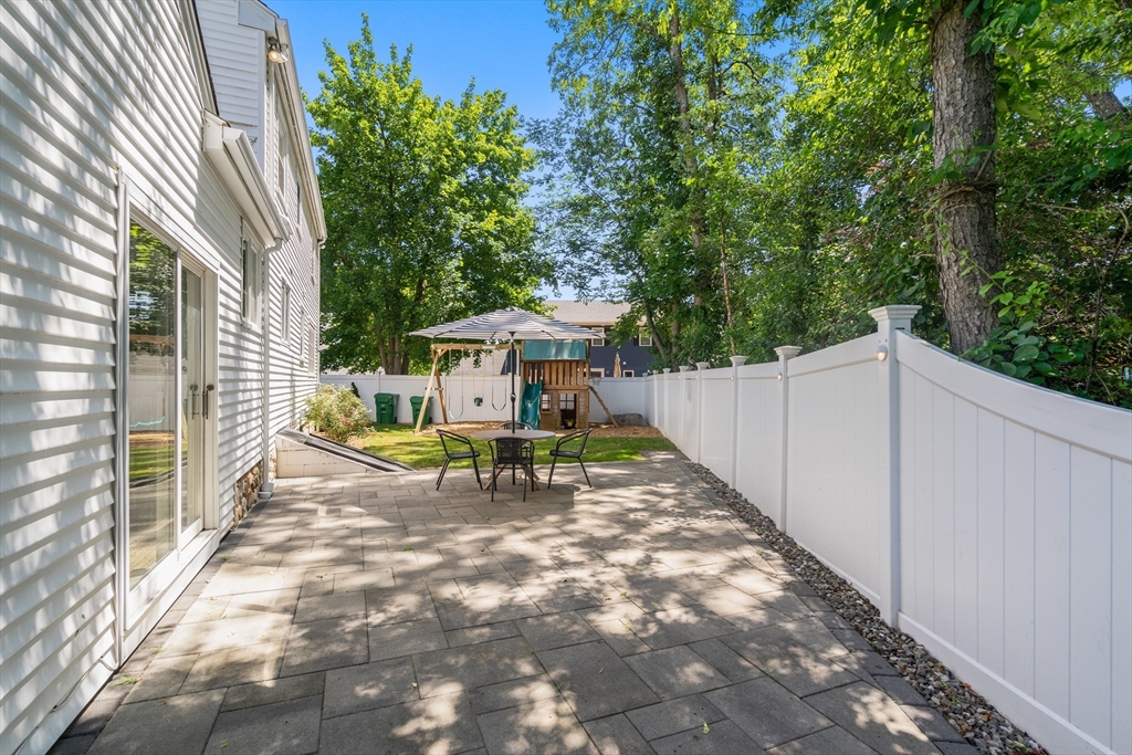 40 Hooper Street Westwood, MA 02090 - Photo 31 of 39 a view of house with backyard and sitting area