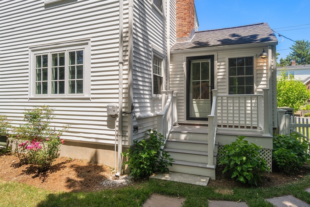 40 Hooper Street Westwood, MA 02090 - Photo 33 of 39 a front view of a house with a yard
