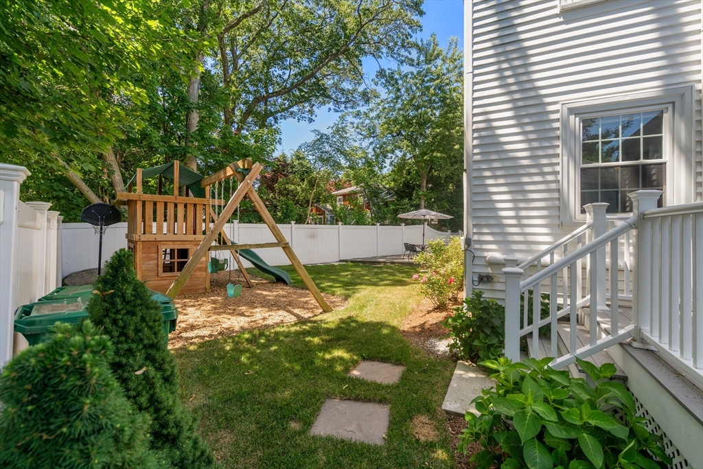 40 Hooper Street Westwood, MA 02090 - Photo 34 of 39 a view of an house with backyard and trees