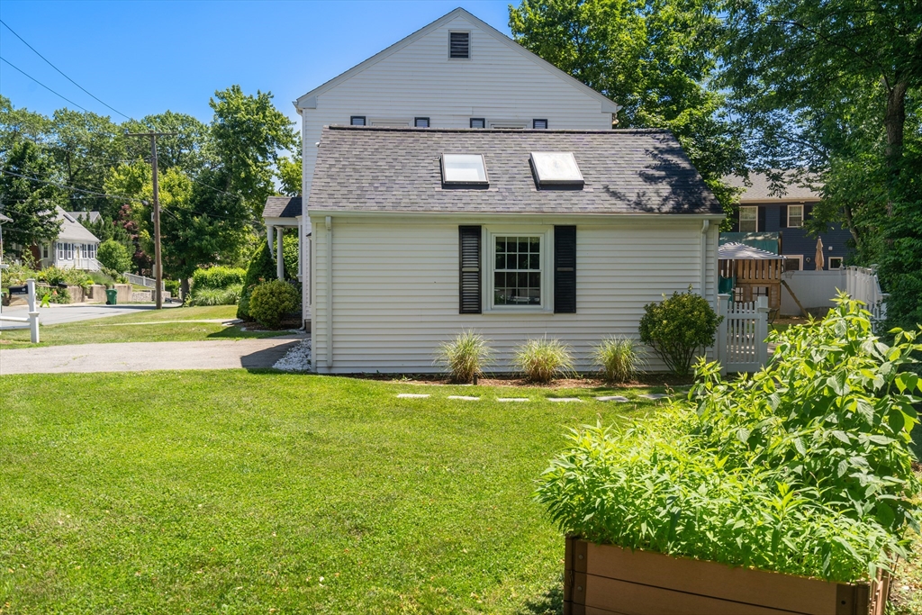 40 Hooper Street Westwood, MA 02090 - Photo 39 of 39 a front view of a house with a yard