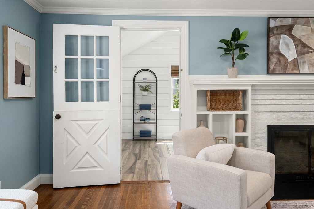 40 Hooper Street Westwood, MA 02090 - Photo 5 of 39 a living room with furniture and a potted plant