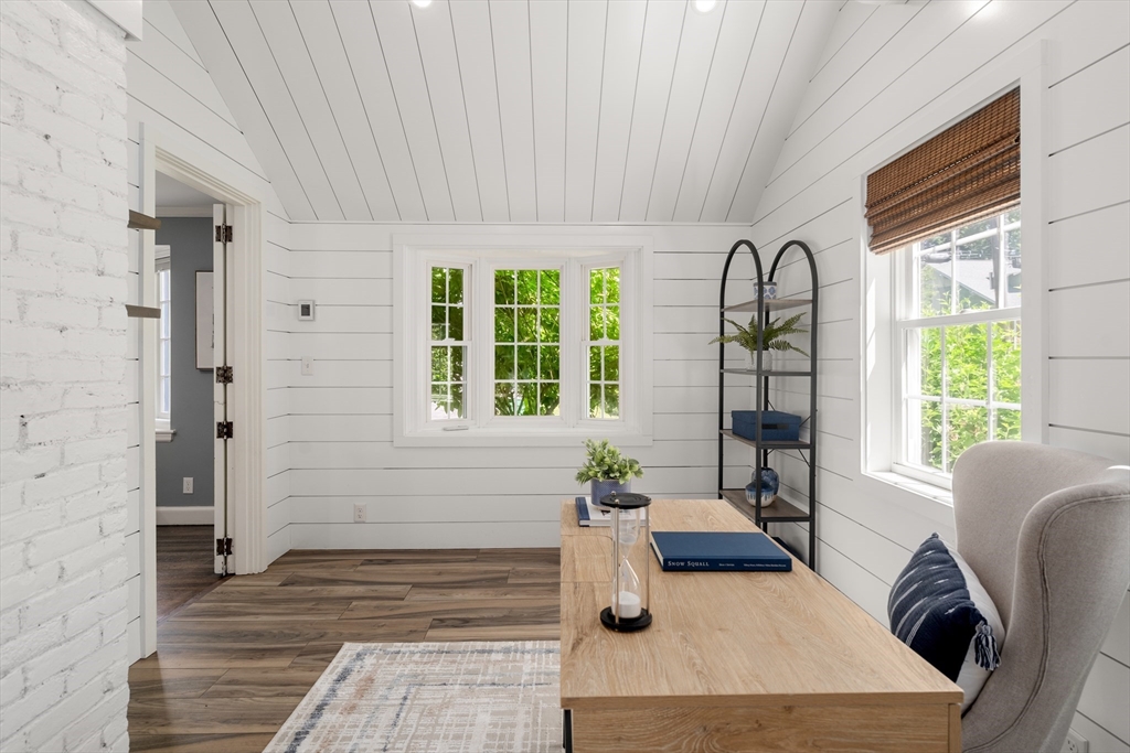 40 Hooper Street Westwood, MA 02090 - Photo 7 of 39 a living room with furniture and a large window
