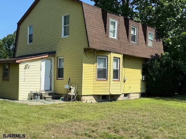 a view of swimming pool with a yard