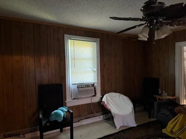 a kitchen with a sink a stove and cabinets