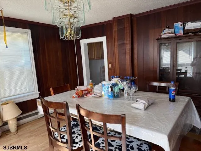 a bathroom with a shower and a sink