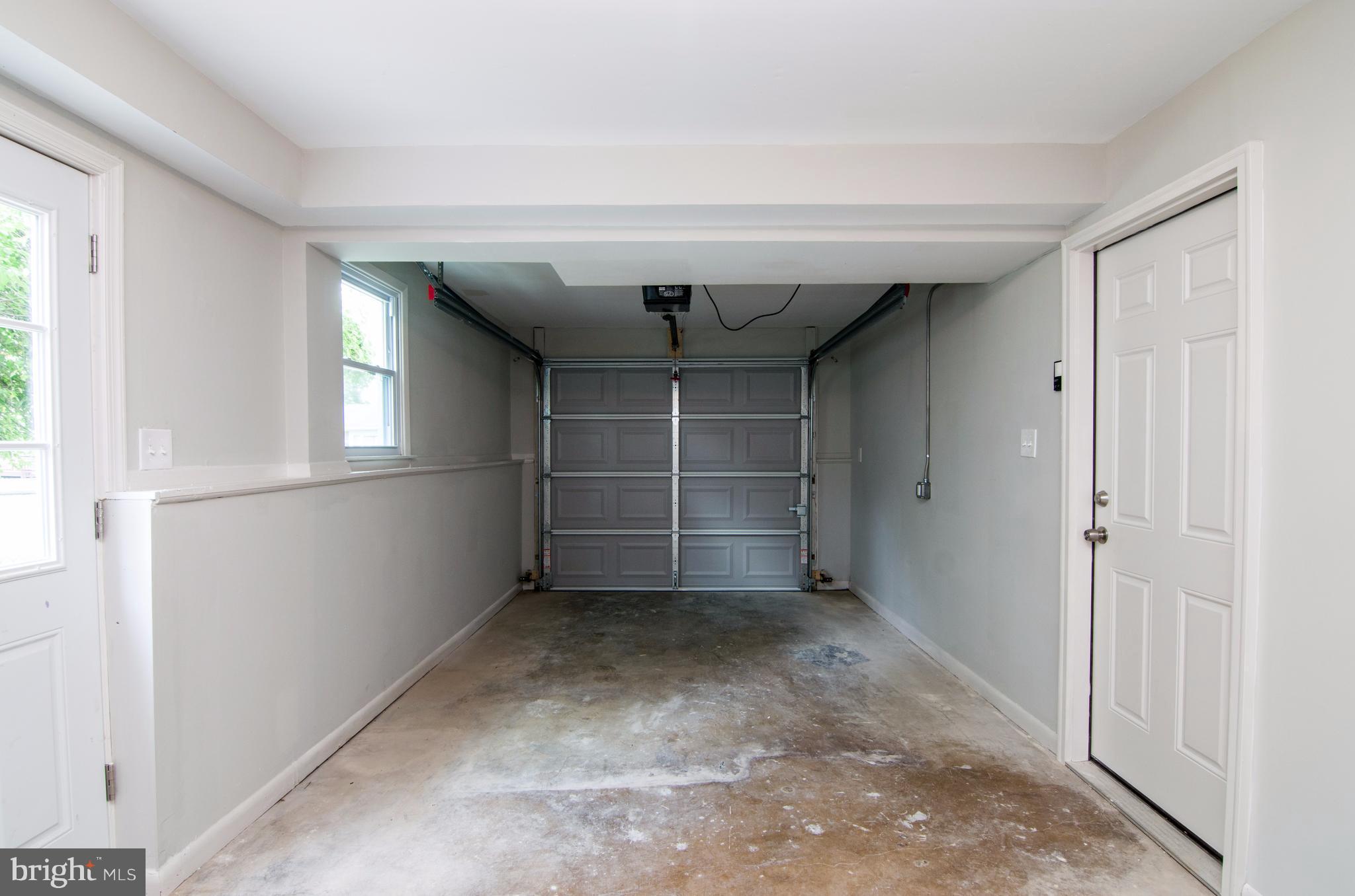 8715 Stephanie Road Randallstown, MD 21133 - Photo 22 of 24 Attached Garage with Remote
