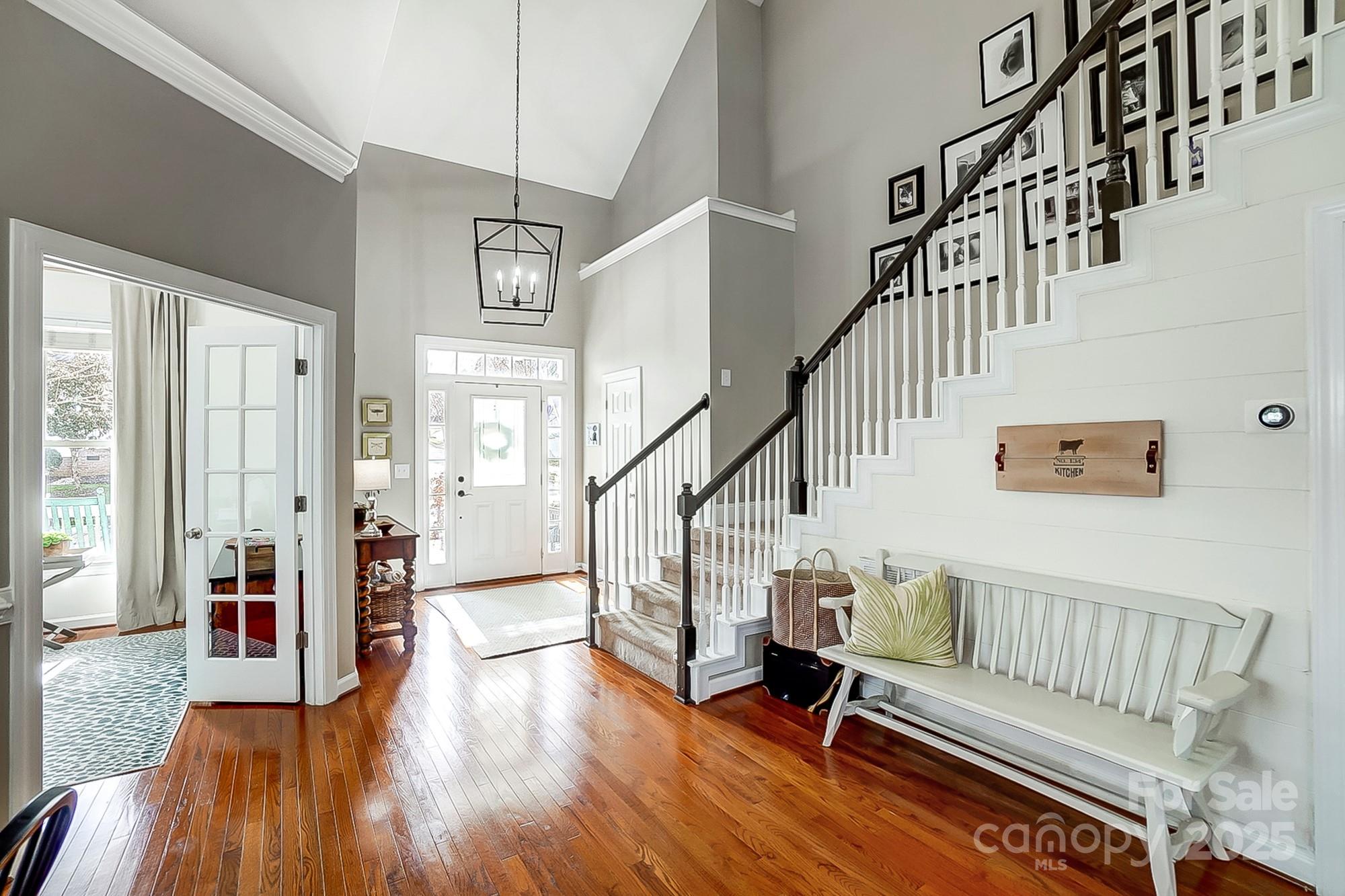 134 Mills Lane Fort Mill, SC 29708 - Photo 16 of 45 a living room with furniture and wooden floor