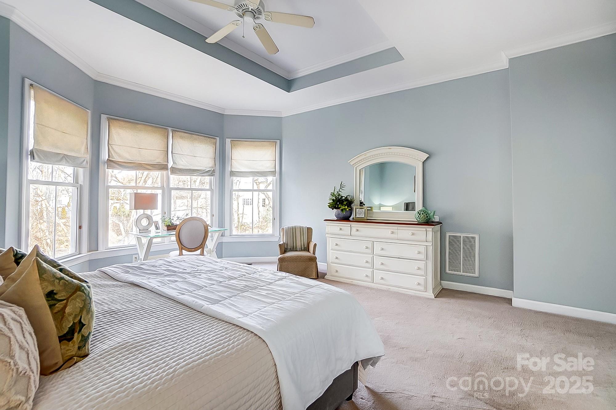 134 Mills Lane Fort Mill, SC 29708 - Photo 21 of 45 a bedroom with a large bed and a window