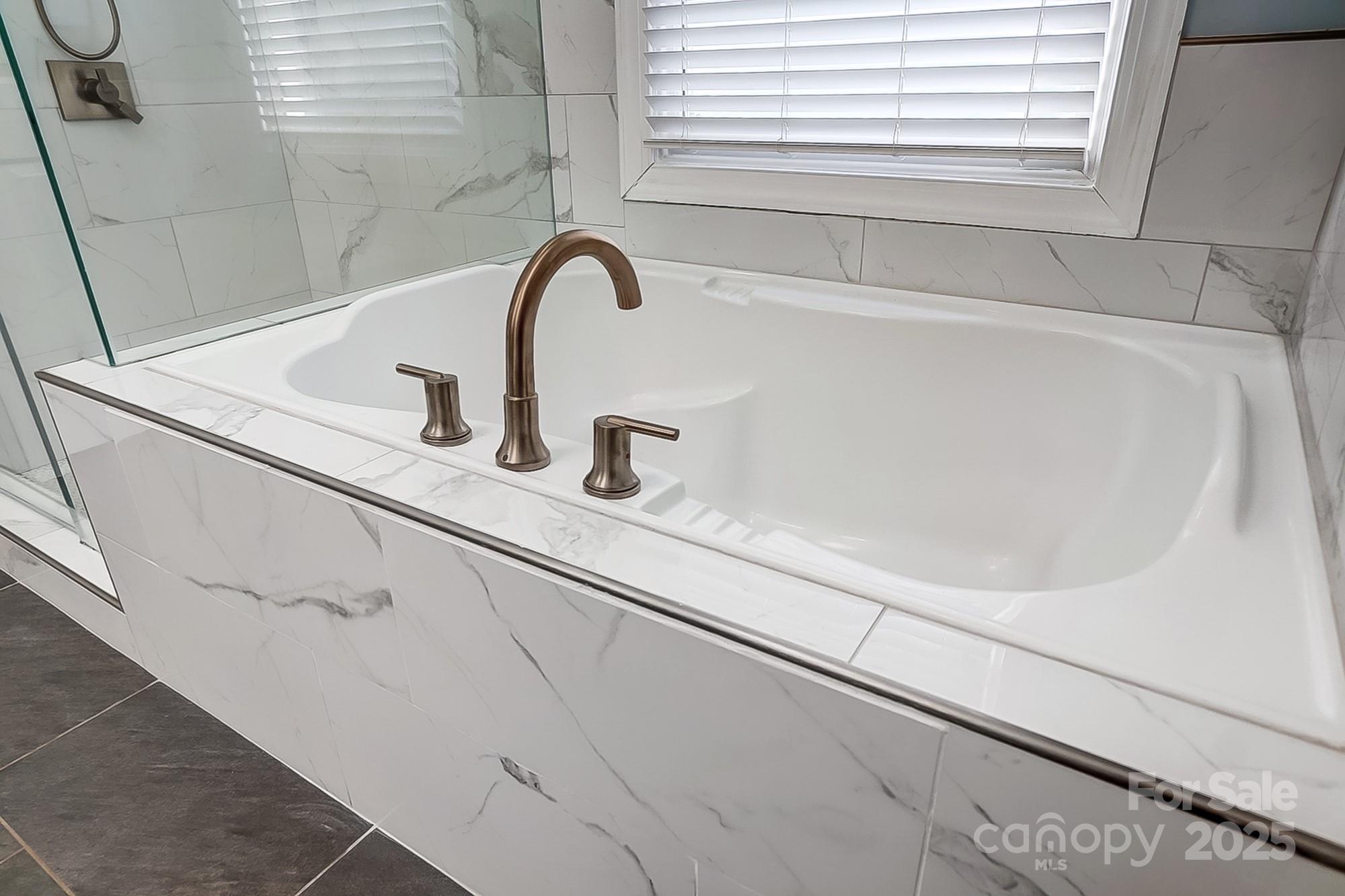 134 Mills Lane Fort Mill, SC 29708 - Photo 25 of 45 a close view of sink and tap