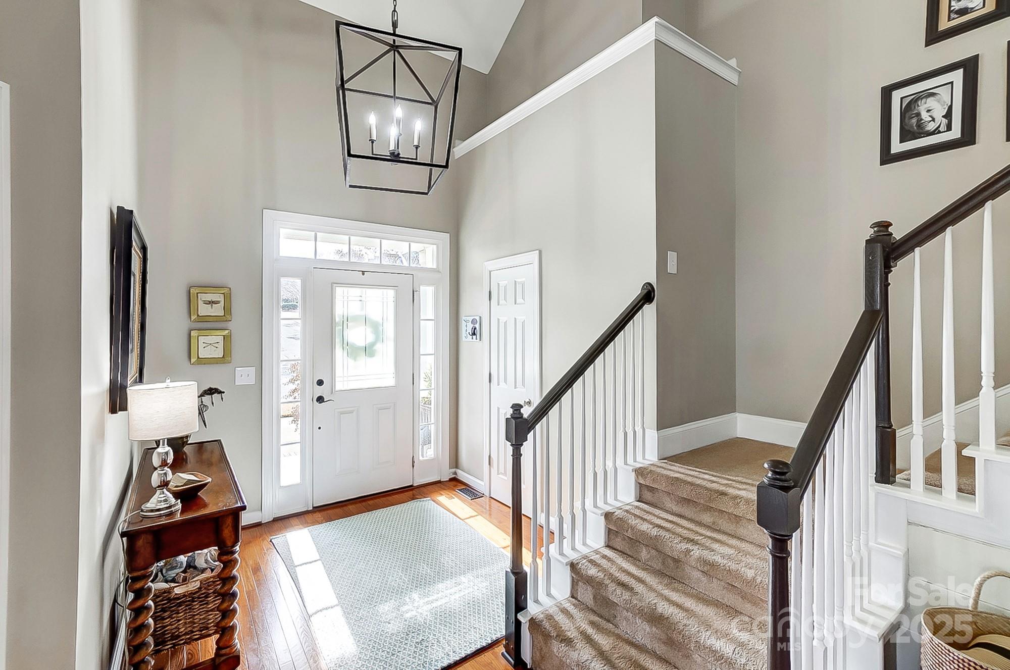 134 Mills Lane Fort Mill, SC 29708 - Photo 3 of 45 a view of a livingroom with furniture and staircase