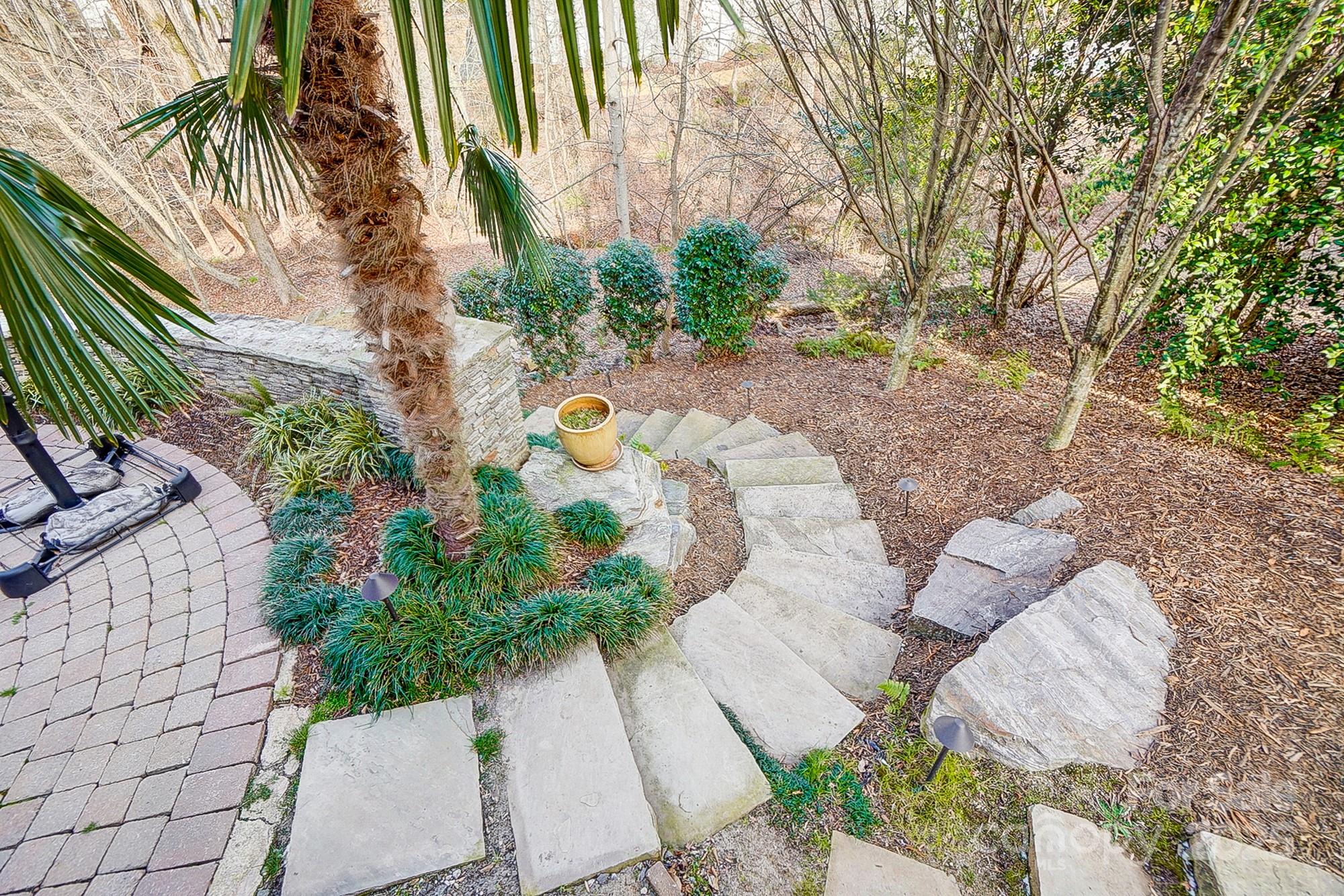 134 Mills Lane Fort Mill, SC 29708 - Photo 41 of 45 a view of backyard with swimming pool and seating