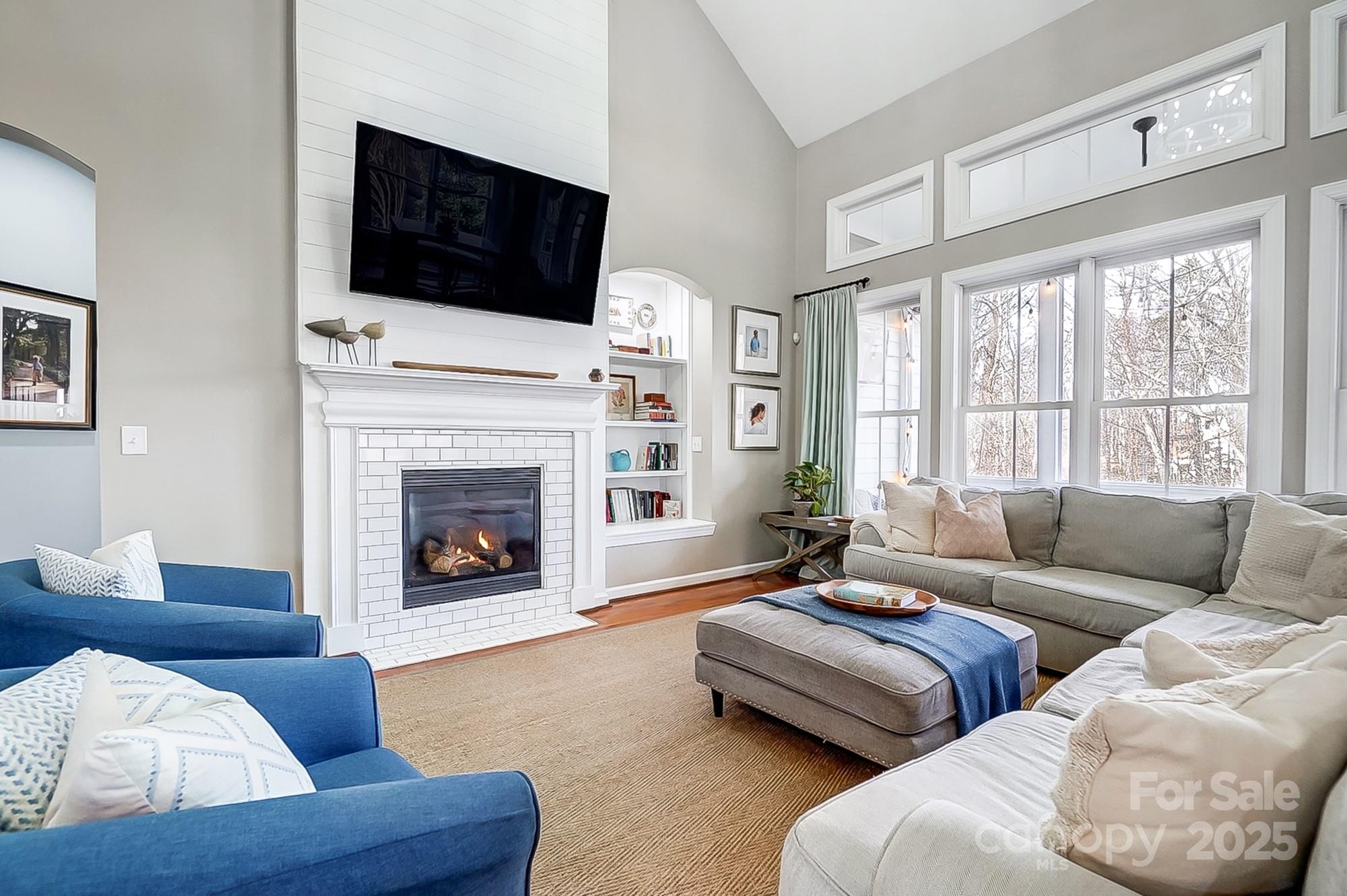 134 Mills Lane Fort Mill, SC 29708 - Photo 6 of 45 a living room with furniture fireplace and flat screen tv