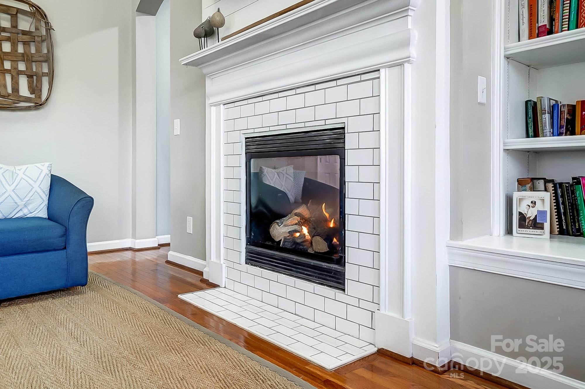 134 Mills Lane Fort Mill, SC 29708 - Photo 8 of 45 a living room with furniture and a fireplace